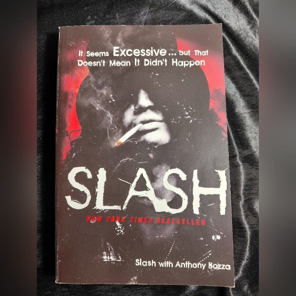 Slash Biography Book. Has highlighter stains and (silly) writing.